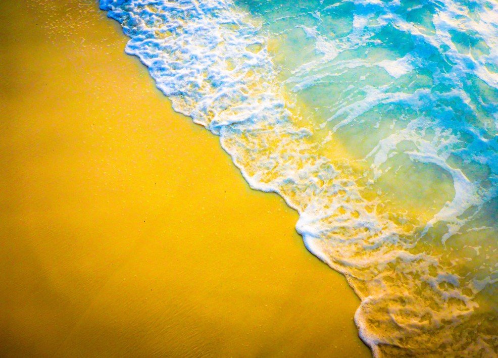 Yellow sand and blue water