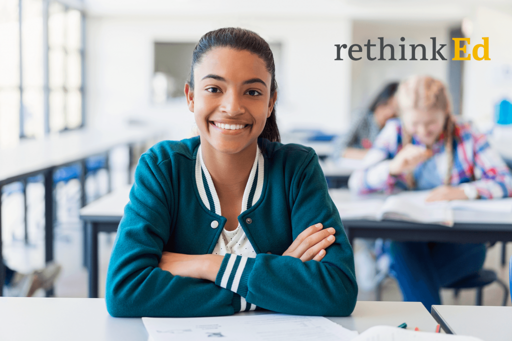 Girl smiling in a classroom