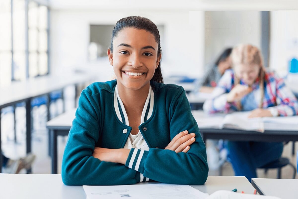 Girl smiling in a classroom