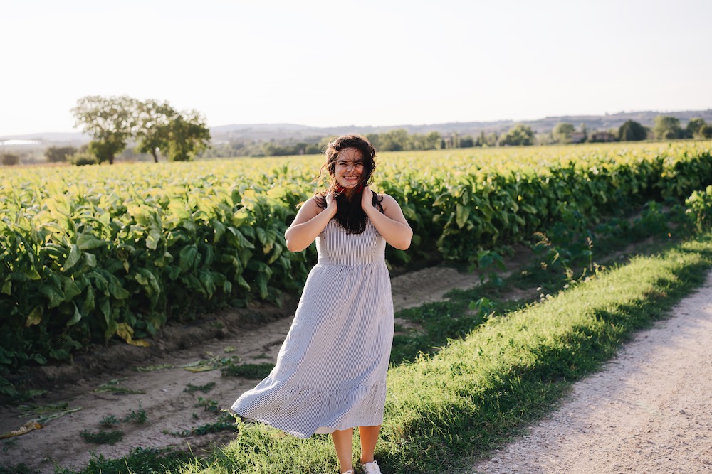 Woman smiling in a field