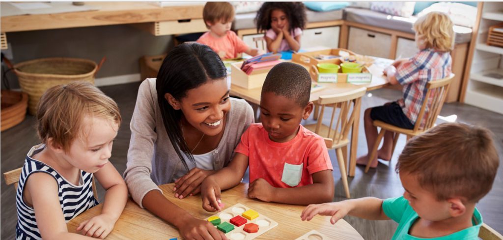 Classroom teacher with young students small group