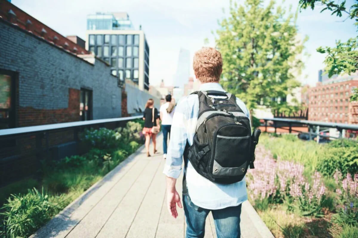 guy walking outdoors on the highline